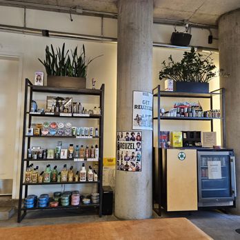 BarberX - Hair care products for sales + fridge holding complimentary Coors beer & Bubly sparkling soda - Barbers Near Me - Denver, Colorado