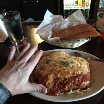 Harry's Bar - Massive chicken parm. (I had them put the meat sauce on mine. Same price. Delicious.) - Bars Near Me - Seattle, Washington