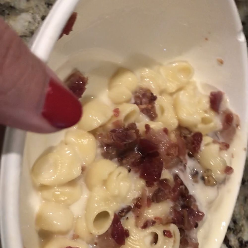 Mostly empty bowl of "large" Mac and cheese. Mostly empty bowl of "large" Mac and cheese.