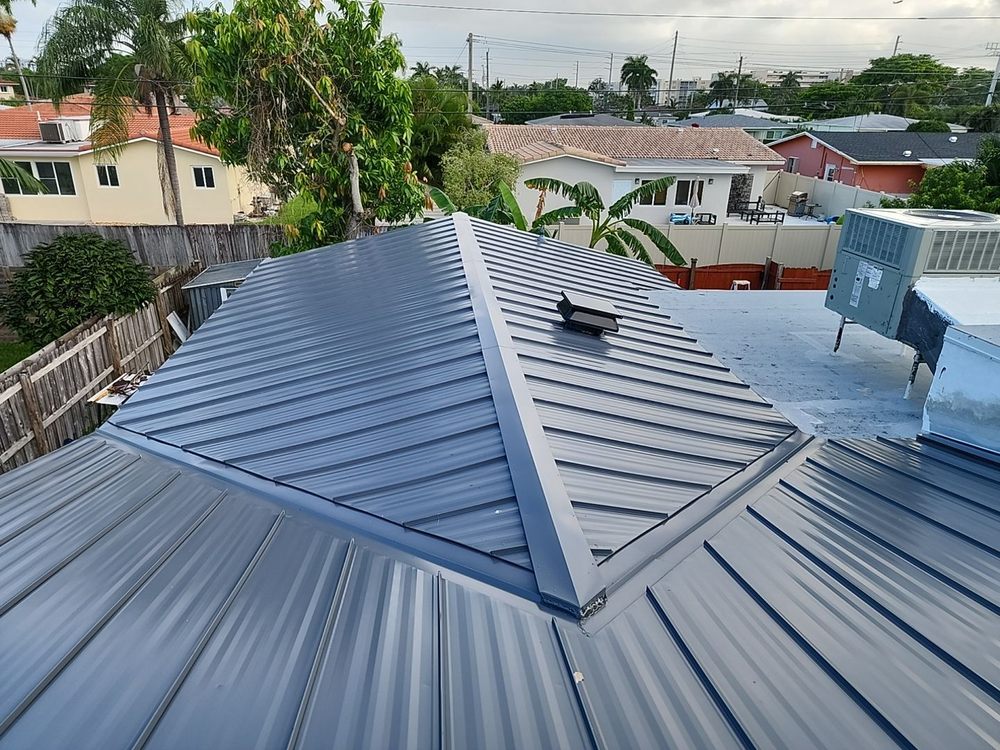 Slide of Dream Team Roofing