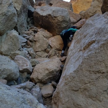 Artist Drive - Climbing rocks by dip #1 - Hotels & Travel Near Me - Death Valley, California