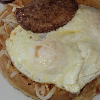Old Town Waffles - Cheesy hash brown waffle comes with hash browns. 2 over medium eggs and a sausage patty - New American Near Me - Clovis, California
