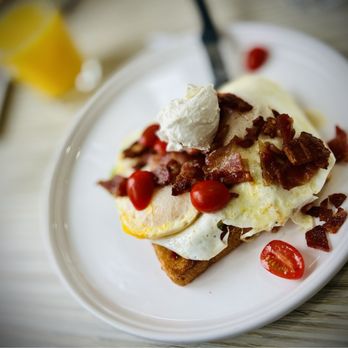 Biscuits And Gravy - a breakfast of eggs, bacon and tomatoes - Salad Near Me - Clawson, Michigan Biscuits And Gravy - a breakfast of eggs, bacon and tomatoes - Salad Near Me - Clawson, Michigan