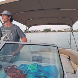 Charter Finders - Captain Keegan at the helm of 19th Tee.
