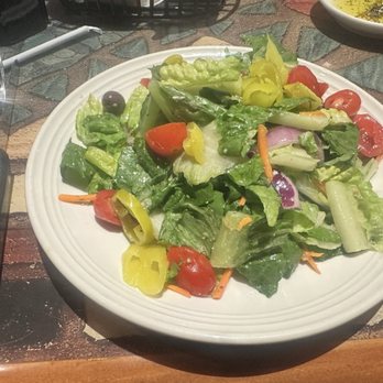 Carrabba's Italian Grill - The salad that came with my meal & it has Viniagrette dressing on it - Italian Near Me - Gilbert, Arizona