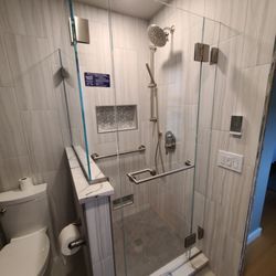 Upstate Showers - Master bathroom walk-in shower with frameless enclosure.