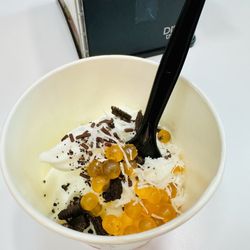Self serve classic froyo with cookies, sprinkles, and popping boba
