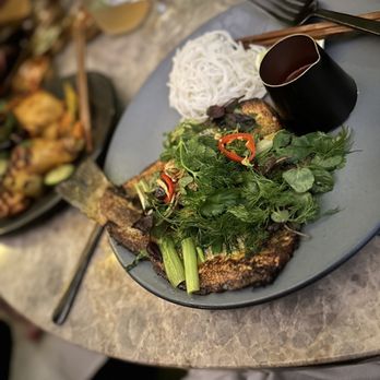 Animae - The Branzino Cha Ca with a herb salad - Asian Fusion Near Me - San Diego, California Animae - The Branzino Cha Ca with a herb salad - Asian Fusion Near Me - San Diego, California