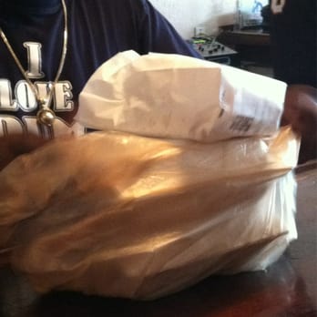 Naz Roti Palace - Curry and buss up roti to go - Trinidadian Near Me - Miramar, Florida