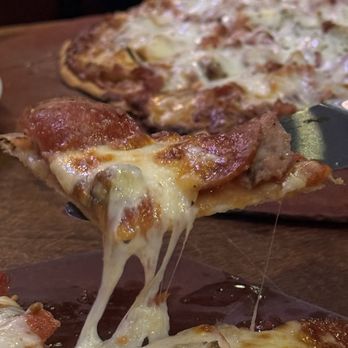 Flo & Santos - build your own (pepperoni, sausage, mushroom) - Pizza Near Me - Chicago, Illinois Flo & Santos - build your own (pepperoni, sausage, mushroom) - Pizza Near Me - Chicago, Illinois