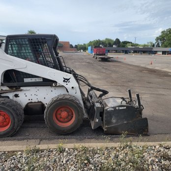 Black Jack Asphalt & Concrete - Foreman Gabe milling/grinding away the old asphalt to prep for the new asphalt - Masonry/Concrete Near Me Black Jack Asphalt & Concrete - Foreman Gabe milling/grinding away the old asphalt to prep for the new asphalt - Masonry/Concrete Near Me