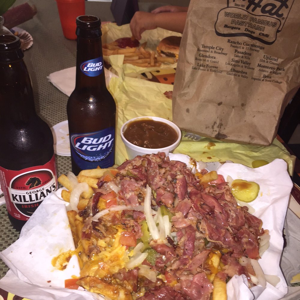 The Hat - Chili cheese fries with tomato, pickles, onions, and pastrami atop. So much pastrami, you can't even see the fries. Sorry, beer is from home - Fast Food Near Me - Glendora, California The Hat - Chili cheese fries with tomato, pickles, onions, and pastrami atop. So much pastrami, you can't even see the fries. Sorry, beer is from home - Fast Food Near Me - Glendora, California