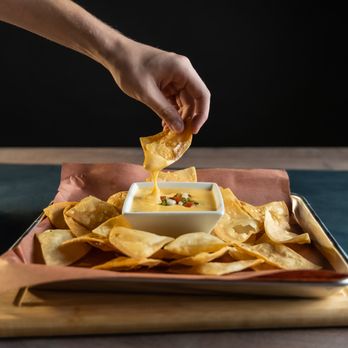 OZ Smokehouse - Fire Roasted Poblano Queso with Chips! - Barbeque Near Me - Rogers, Arkansas OZ Smokehouse - Fire Roasted Poblano Queso with Chips! - Barbeque Near Me - Rogers, Arkansas