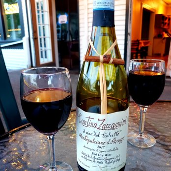 Arlo's Ristorante - a glass of wine and a bottle - Italian Near Me - Sandpoint, Idaho Arlo's Ristorante - a glass of wine and a bottle - Italian Near Me - Sandpoint, Idaho