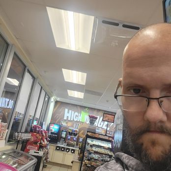 Arco - a man with a beard and glasses in a store - Gas Stations Near Me - Hesperia, California Arco - a man with a beard and glasses in a store - Gas Stations Near Me - Hesperia, California