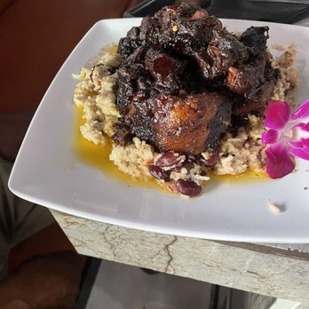Cache 42 Kitchen & Cocktails - Oxtails with rice .... - Cocktail Bars Near Me - Memphis, Tennessee Cache 42 Kitchen & Cocktails - Oxtails with rice .... - Cocktail Bars Near Me - Memphis, Tennessee