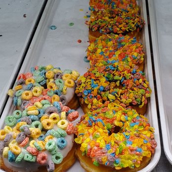 Randy's Donuts - Fruit loops donut and Coco pebble's donut. - Donuts Near Me - Downey, California