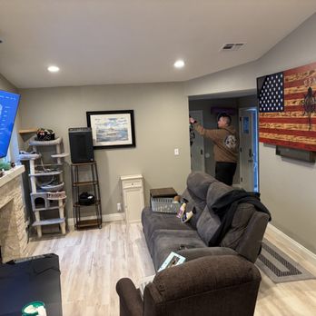 ARC America's Restoration and Construction - Packed back in the house living room looks incredible! We love all the work they did!! - Damage Restoration Near Me - La Mesa, California
