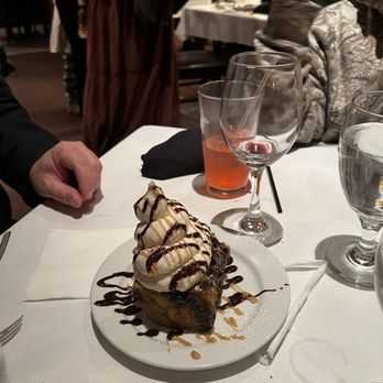 Vito's Italian Restaurant - Bread pudding that has a "dollop" of cannoli filling on top - Italian Near Me - Saint Johns, Florida Vito's Italian Restaurant - Bread pudding that has a "dollop" of cannoli filling on top - Italian Near Me - Saint Johns, Florida