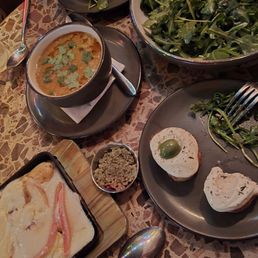 Raclette over potatoes, Red Lentil Dahl Soup, Arugula Salad and Cheese Wiz