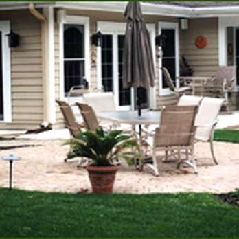Macchione's Landscaping - a patio with a table and chairs - Landscaping Near Me - Galloway, New Jersey