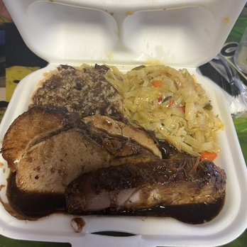 Rodney's Jamaican Grill - Jerk pork tenderloin with rice and beans. And cabbage medley. - Caribbean Near Me - Bradenton, Florida Rodney's Jamaican Grill - Jerk pork tenderloin with rice and beans. And cabbage medley. - Caribbean Near Me - Bradenton, Florida