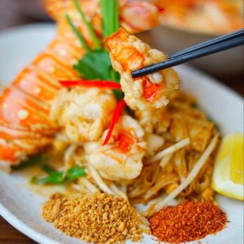 Bangkok Kitchen - a plate of food with shrimp and noodles - Thai Near Me - Latham, New York Bangkok Kitchen - a plate of food with shrimp and noodles - Thai Near Me - Latham, New York