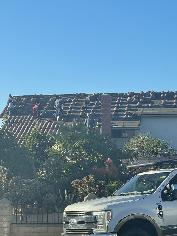 Slide of H Moreno Roofing