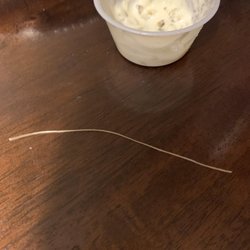 Doc's Pizza & Steaks - Tartar sauce with piece of plastic that came out of it.
