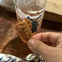 I don't why they think this is ok to serve to people. Little wings. Never going to this location again