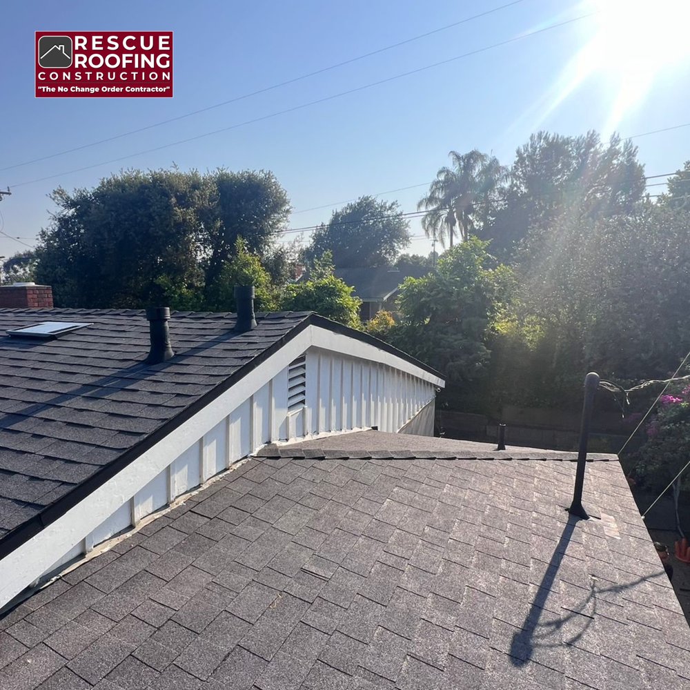 Slide of Rescue Roofing Construction