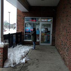 Railroad Ave Liquors - Next day same lady is smoking cigarettes in front of the door of her employment while on shift.  No smoking is a well known law