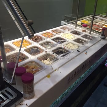 Yogurtland - Dirty toppings counter. Might as well have them all mixed in a big bowl... - Ice Cream & Frozen Yogurt Near Me - Eagle Rock, California