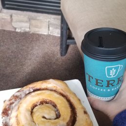 Cinnamon roll and coffee. Cinnamon roll and coffee.