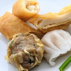 Donut Delight Express - Pork dumpling with basil, never had it like this and pretty good. The eggroll and fried fishcake I thought were samples but we got charged