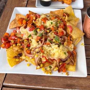 Bar 430 - CURRIED NACHOS (GF) - $11 Red Pepper - Corn - Carrots - Cherry Tomato - Red Onion - Curry Sauce - Corn Tortilla Chips - Habanero Muenster - Cocktail Bars Near Me - Oshkosh, Wisconsin