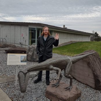 Museum of the Earth - With a statue of Coelophysis outside the Museum of the Earth. This dinosaur may have existed in New York based on fossilized tracks that mat - Museums Near Me - Ithaca, New York