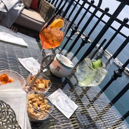 Spritz's with a view from the terrace by the pool. Bartender was extremely kind! (Snacks were included) Spritz's with a view from the terrace by the pool. Bartender was extremely kind! (Snacks were included)