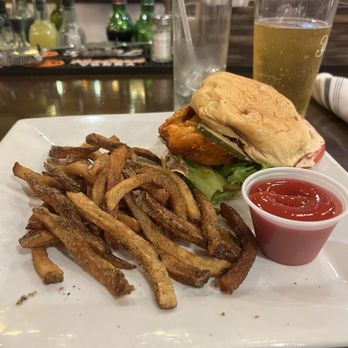 Rascals Tavern - Buffalo Chicken Sandwich, French Fries - Bars Near Me - Greensboro, North Carolina