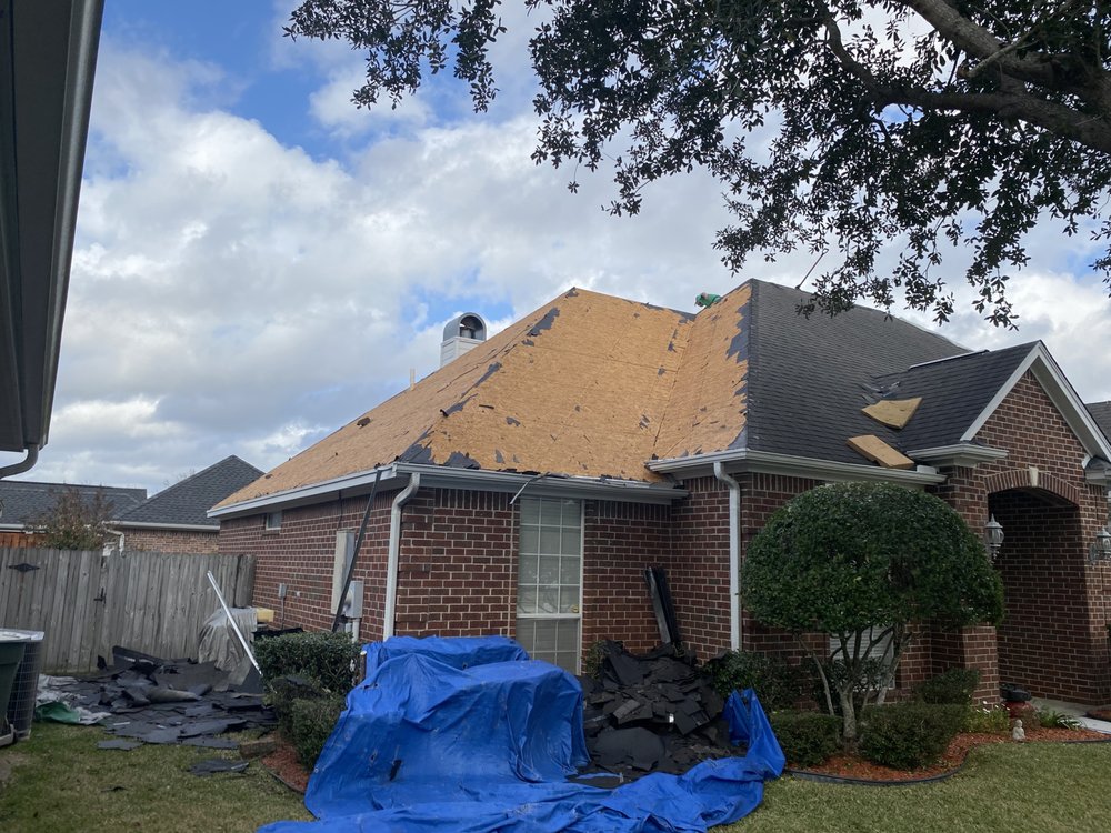 Slide of Arnold Roofing and Construction