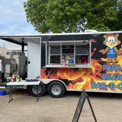 Papa Bear Bar-B-Que - Papa Bear Bar-B-Que food truck. Owner Dan at the left and son-in-law in the service window.