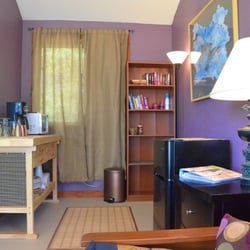 Lake Travis Tree Lodge - Kitchenette area of living room - coffee pot, microwave and fridge