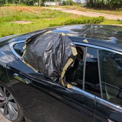 Greentec EV & Hybrid Batteries - They literally left my window down and taped in the rain!!