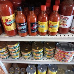 La Perla Market - Big cans of yellowfin tuna, big bottles of hot sauce