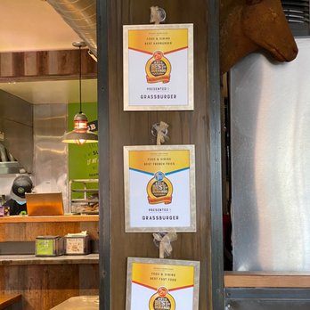 Grassburger - Wall showing Grassburger's numerous awards. Tasty burgers and fries. - Burgers Near Me - Durango, Colorado
