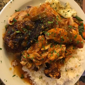 Mo's Restaurant - Fish plate with rice and veggies. - Haitian Near Me - Key West, Florida Mo's Restaurant - Fish plate with rice and veggies. - Haitian Near Me - Key West, Florida