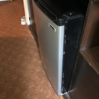 SureStay Plus Hotel by Best Western Lompoc - Small tight walkway especially due to the fact the refrigerator is falling out of the cabinet and was dirty and dusty. - Hotels Near Me - Lompoc, California SureStay Plus Hotel by Best Western Lompoc - Small tight walkway especially due to the fact the refrigerator is falling out of the cabinet and was dirty and dusty. - Hotels Near Me - Lompoc, California