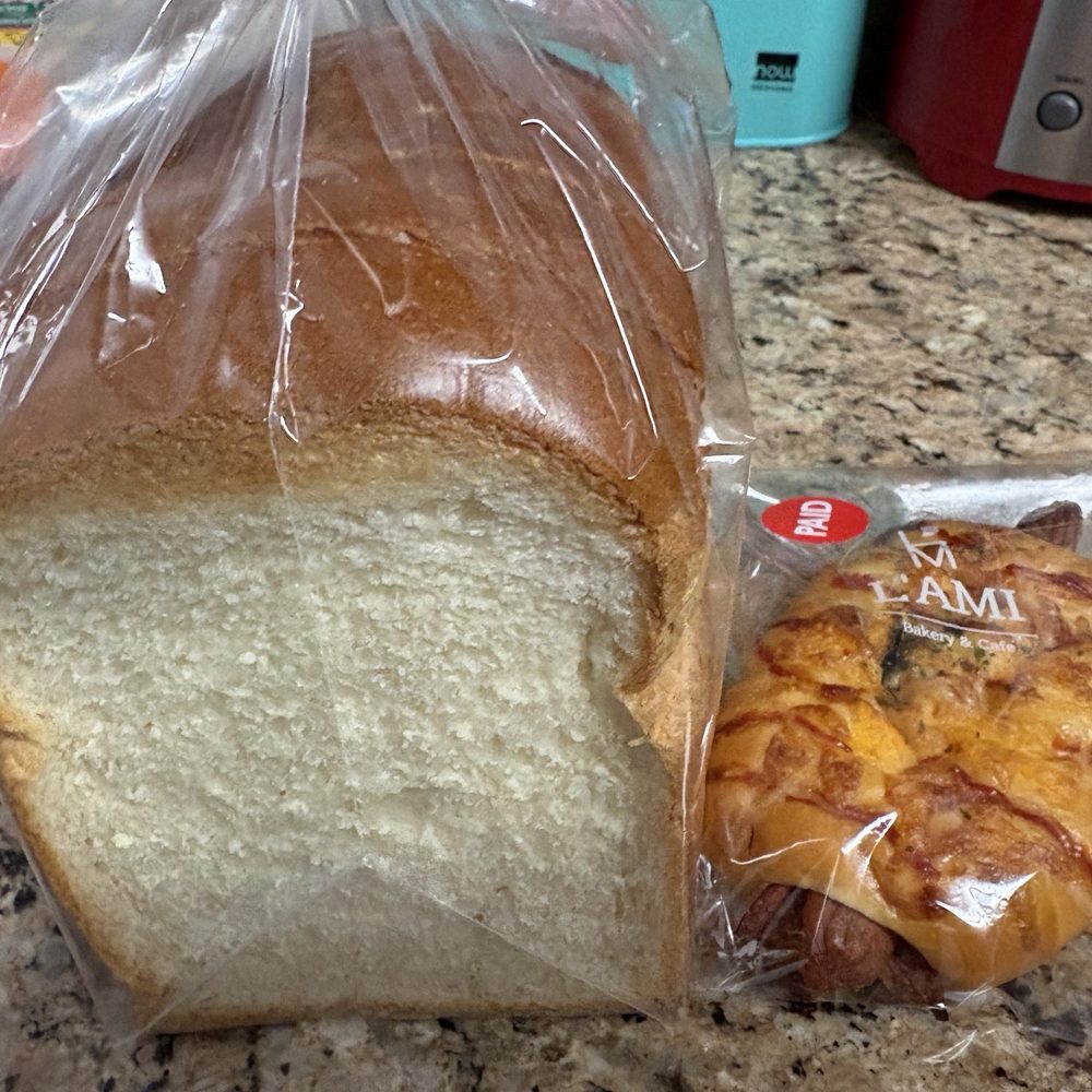 L'AMI Bakery & Cafe - milk pan bread (left) and sausage roll bread (right) - Bakeries Near Me - Jericho, New York