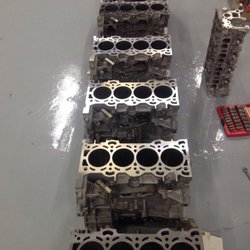 Overspeed Motorsports - A handful of blocks and a cylinder head fresh off the surfacer.