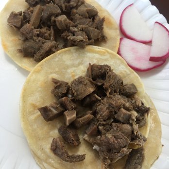 El Rey Del Taco - two tacos on a paper plate - Food Trucks Near Me - Modesto, California
